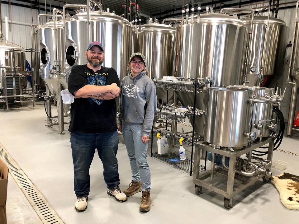 Sean Lally, left, is the head brewer at Poverty Knob, a new brewery opening Nov. 22 at Port Farms. Casey Port said her whole family is working on the project.