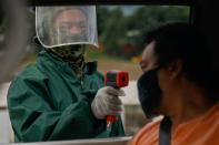 Philippine capital back on strict lockdown amid coronavirus infections spike