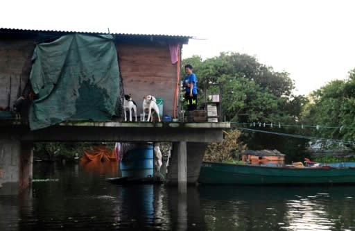 In some parts of Nanawa, floodwaters have risen almost as high as street signs