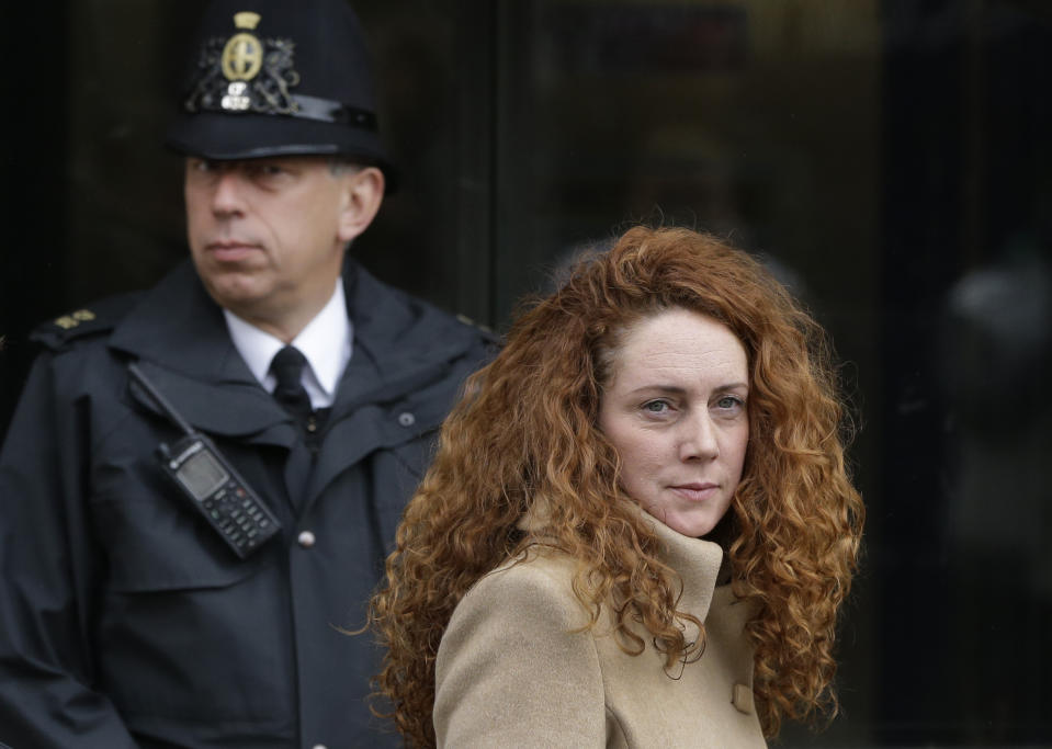 Rebekah Brooks, the former chief of News Corp.'s British operations, leaves the Old Bailey court in London London, Wednesday, Sept. 26, 2012. Brooks was in court to face charges connected to the phone hacking scandal that rocked Rupert Murdoch's News Corp. empire. (AP Photo/Lefteris Pitarakis)