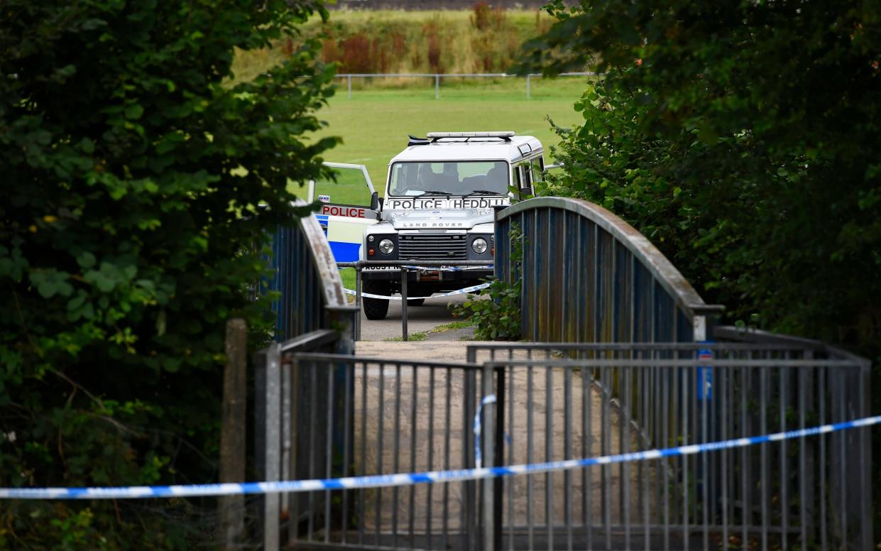 Police vehicle at the bridge over River Ogmore at Sarn, Bridgend where a five year boy was found dead in the river - Wales News Service