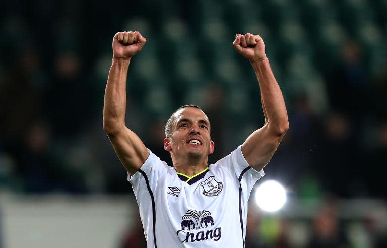 Everton's English midfielder Leon Osman celebrates during the UEFA Europa League Group H football match VfL Wolfsburg vs Everton FC in Wolfsburg, Germany on November 27, 2014