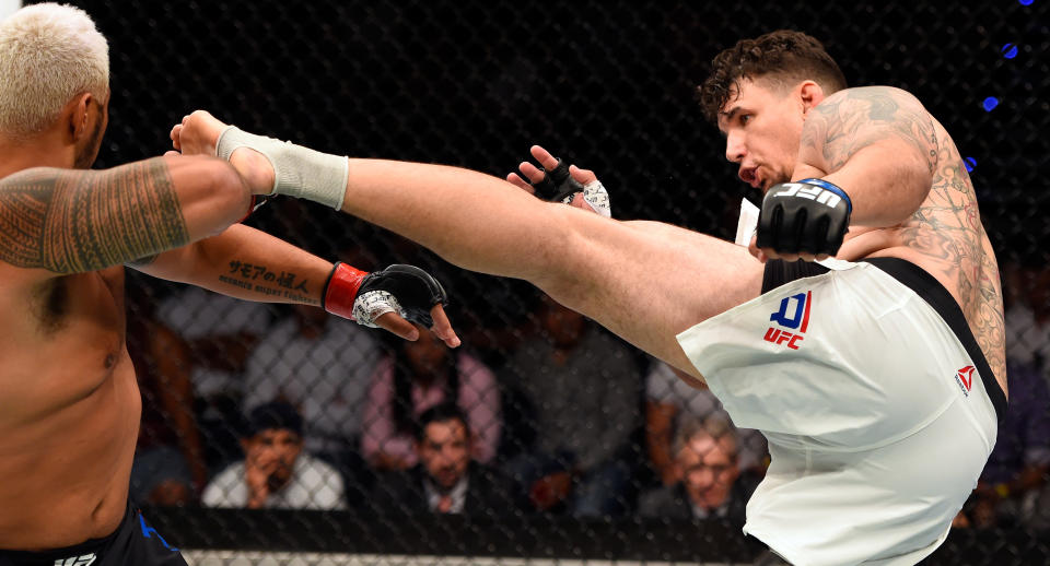 Frank Mir (R) was knocked out by Mark Hunt on March 20, 2016, in Brisbane, Australia. (Getty Images)