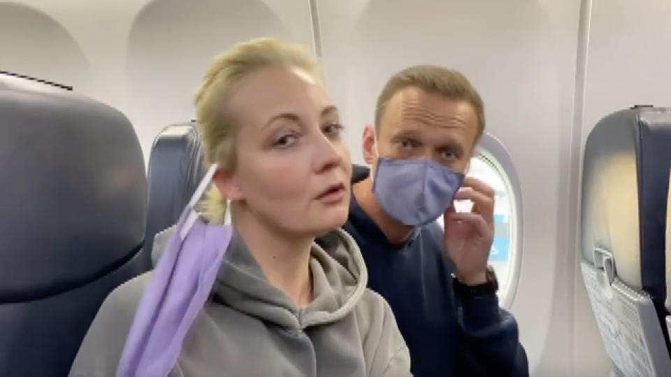 A screen grab of Alexei Navalny and Yulia Navalnaya taken from a video posted on the Instagram account @navalny shows Russian opposition Leader Alexei Navalny before from Berlin to Moscow on January 17, 2021.