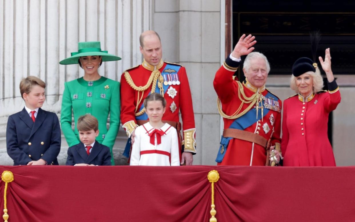 Prince George of Wales, Prince Louis of Wales, Catherine, Princess of Wales, Princess Charlotte of Wales, Prince William, Prince of Wales, King Charles III, Queen Camilla stand on the balcony - Chris Jackson/Getty Images