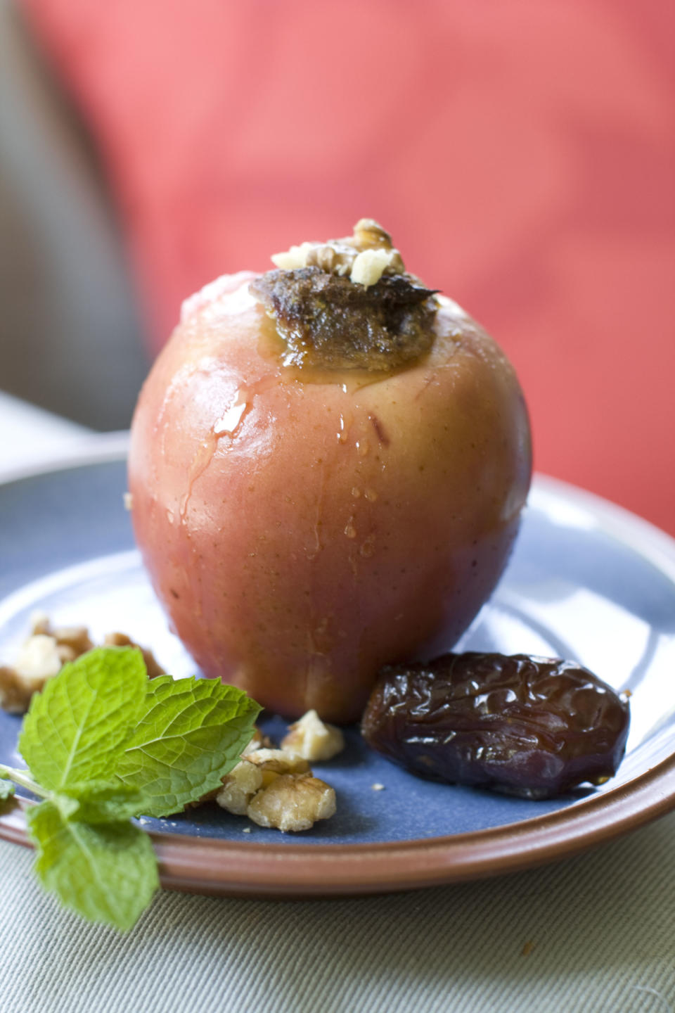 This July 29, 2013 photo shows baked honey date apples in Concord, N.H. (AP Photo/Matthew Mead)