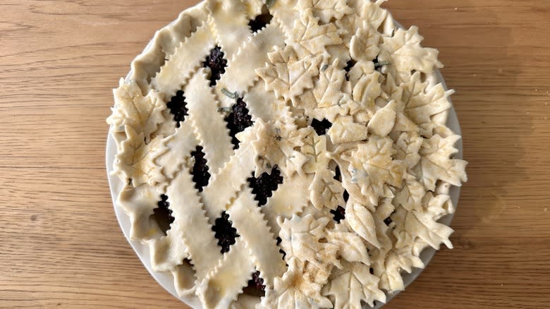 unbaked pie with leaf cutouts