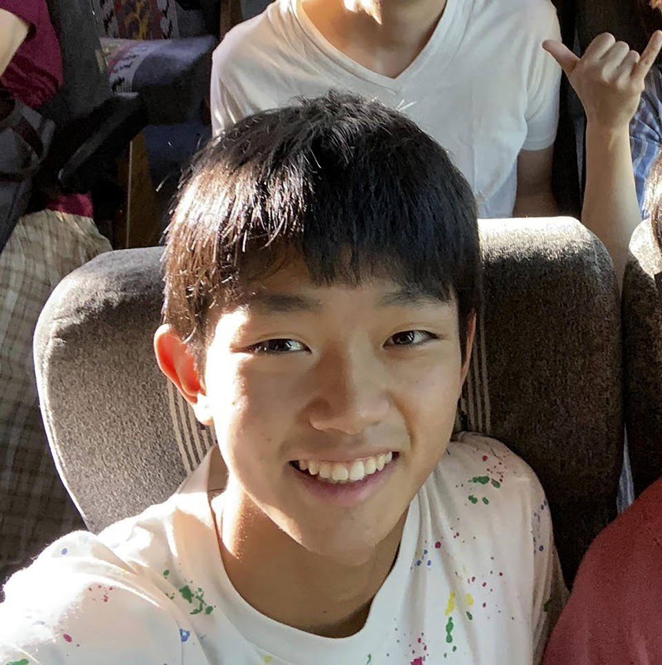 In this Dec. 14, 2019, photo released by Syu Kato, Syu Kato takes a selfie in Guam. Curbing the spread of the coronavirus outbreak rests on accurate knowledge of where infected people have been and whom they have come in contact with so they can be tested and treated. Kato, a 16-year-old Japanese computer whiz, has designed an iPhone software application that uses GPS so people can keep their own records of where they've been. (Syu Kato via AP)