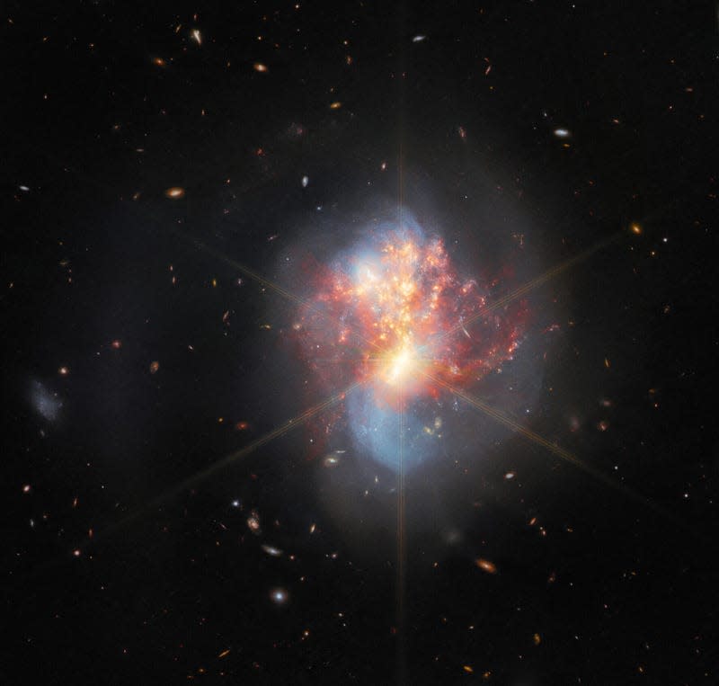 Webb's image of the same galaxy is more colorful in red and blue light.