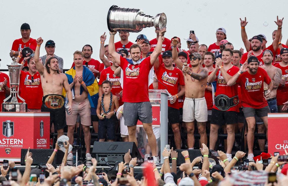 Florida Panthers center Aleksander Barkov (16) lifts the Stanley Cup during the Florida Panthers Stanley Cup victory rally along A1A in Fort Lauderdale, Florida on Sunday, June 30, 2024.