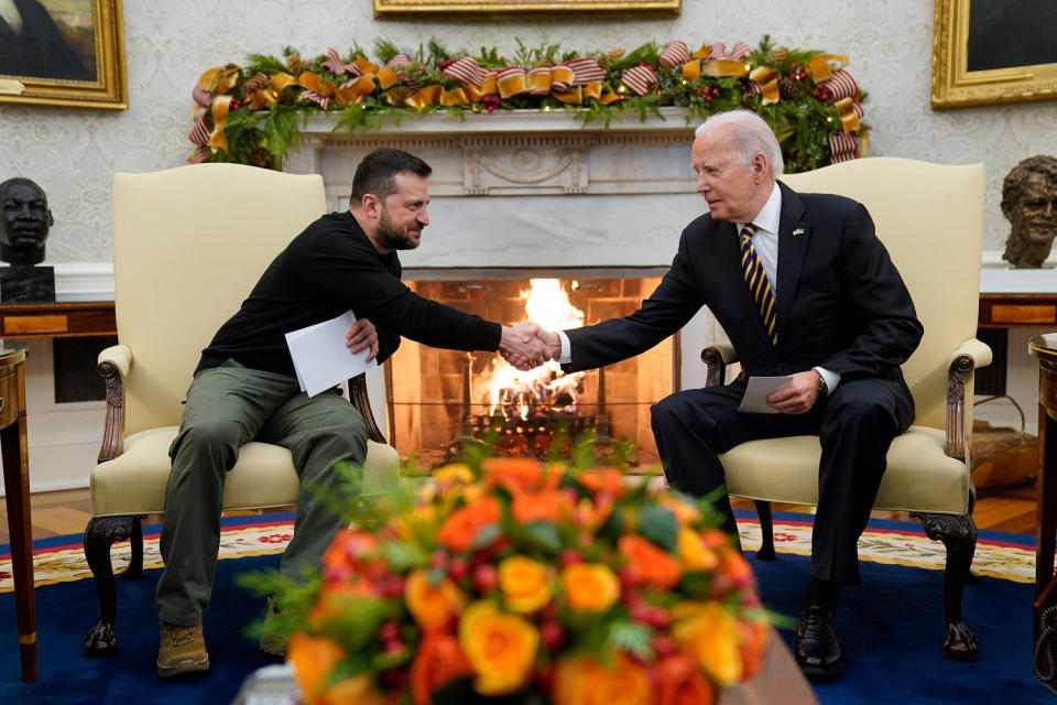 President Joe Biden shakes hands with Ukrainian President Volodymyr Zelenskyy. (Evan Vucci / AP)