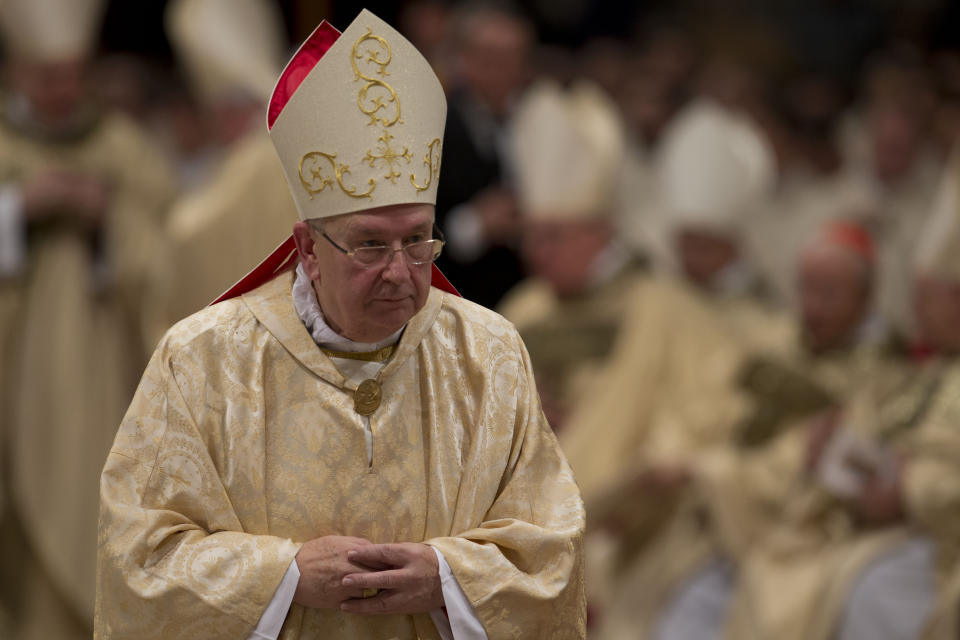 FILE - Fernando Vergez Alzaga leaves the altar after he was elevated to bishop by Pope Francis, during a Mass celebrated in St. Peter's Basilica at the Vatican, Friday, Nov. 15, 2013. Pope Francis said Sunday, May 29, 2022 he has tapped 21 churchmen to become cardinals, most of them from continents other than Europe, which has dominated Catholic hierarchy for most of the church's history. (AP Photo/Andrew Medichini, File)