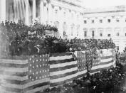 FILE - This March 5, 1877 file photo shows a general view of the grand stand during the inauguration of Rutherford B. Hayes, in Washington. Hayes, whose presidency was marked by the retrenchment of federal troops from the post-Civil War South and ongoing resistance from Southern whites to equal rights for Blacks, declared during his 1877 inaugural that true peace could be achieved through the “united and harmonious efforts of both races” and the honest work of local self-government. (AP Photo, File)