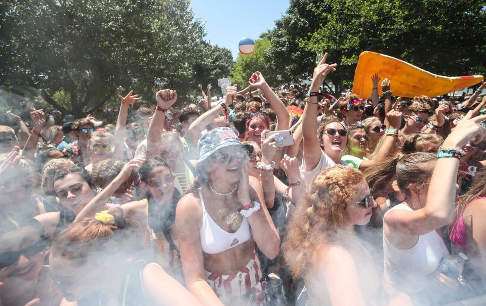 The music was loud and the temperatures hot at the Party Cove as people danced during the second day of Forecastle Festival Saturday, July 13, 2019.