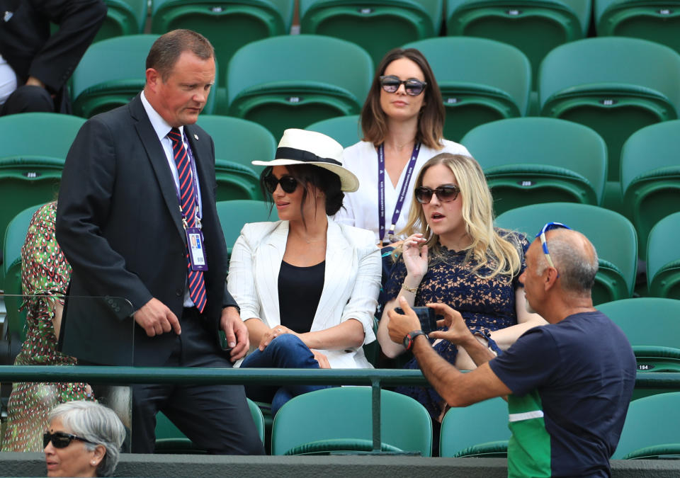 A similar situation unfolded very differently at Wimbledon when Meghan Markle's security detail reprimanded selfie-taker Hasan Hasanov. Photo: Getty Images