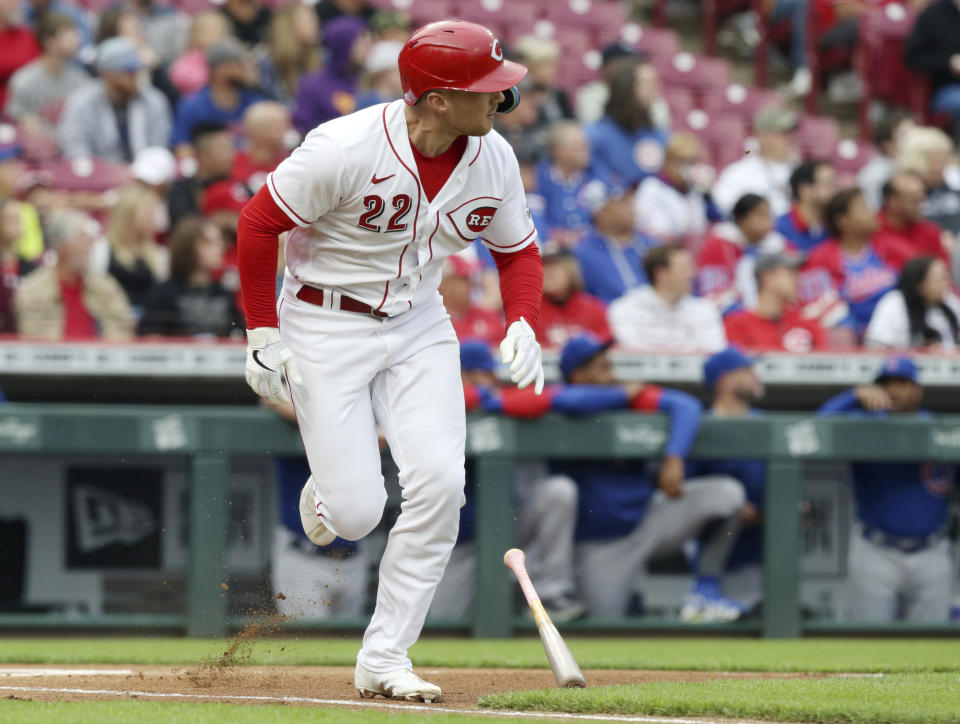 Cincinnati Reds' Brandon Drury watches his double against the Chicago Cubs during the first inning of a baseball game in Cincinnati, Monday, May 23, 2022. (AP Photo/Paul Vernon)