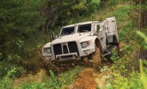 <p>The abilities that make a vehicle ready to fight a war often translate well into peacetime adventure-seeking. There’s no guarantee that Oshkosh’s latest Joint Light Tactical Vehicle (JLTV) will ever be a hit with civilians in the way that Jeep and Hummer have been, but surely some of its engineering will eventually make the transition. The JLTV is the replacement for the military Humvee, and that, in turn, makes it a lineal successor to the original World War II Jeep.<br><br></p><p>At the core of the JLTV’s abilities is Oshkosh’s “TAK-4i” intelligent independent suspension. Built of massive cast pieces, it has been used on other Oshkosh military vehicles, offers up to 20 inches of wheel travel, and can be raised or lowered to suit conditions. That’s enough, says Oshkosh, to increase speeds over virtually any terrain by up to 70 percent over Humvee specification. Details about the suspension are not public knowledge. At least not yet. Apparently, though, this particular system doesn’t use coil springs.<br><br></p><p>Power for the JLTV comes from GM’s familiar 6.6-liter turbo-diesel V-8, the engine marketed as the Duramax in large GM pickups. The contract for the first 17,000 JLTVs was awarded in 2015, with deliveries scheduled to start in 2018. Initially, there will be two models, a four-seater and a two-seat version, and either can be fitted with various support bodies. Armored to protect against roadside explosive devices and other attacks, it’s supposed to be more reliable and safer than current Humvees.<br><br></p><p>Let’s see how long before Arnold Schwarzenegger gets one.</p>