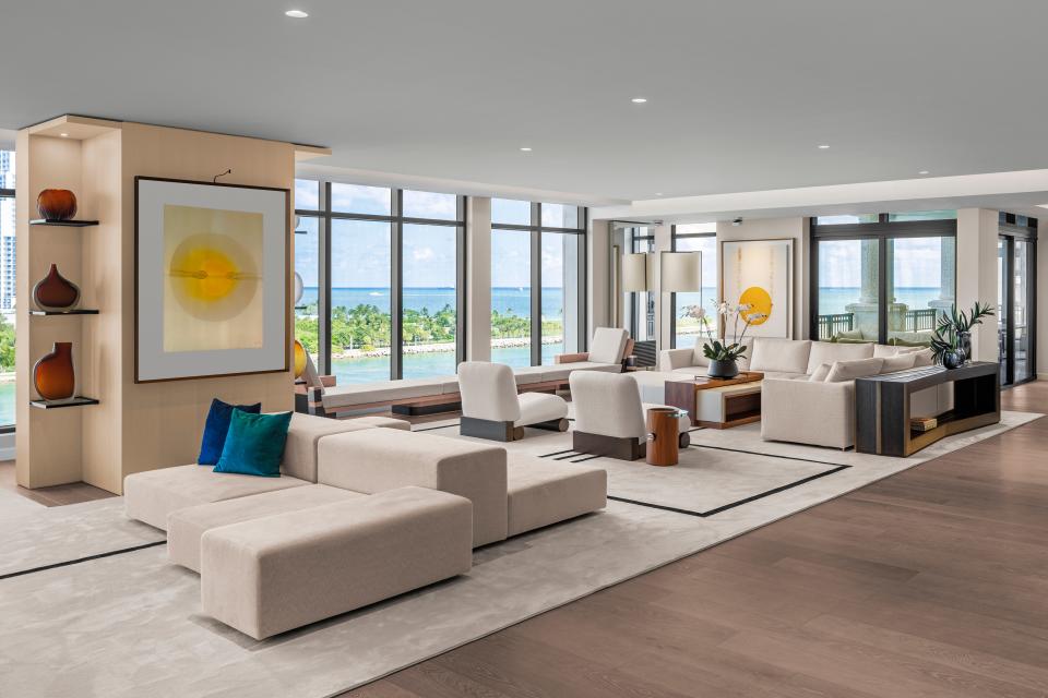 Elegance meets tranquility in this meticulously crafted penthouse on Fisher Island, Miami Beach. Each piece of custom furniture, designed by Juan Poggi, reflects the owner's discerning taste.