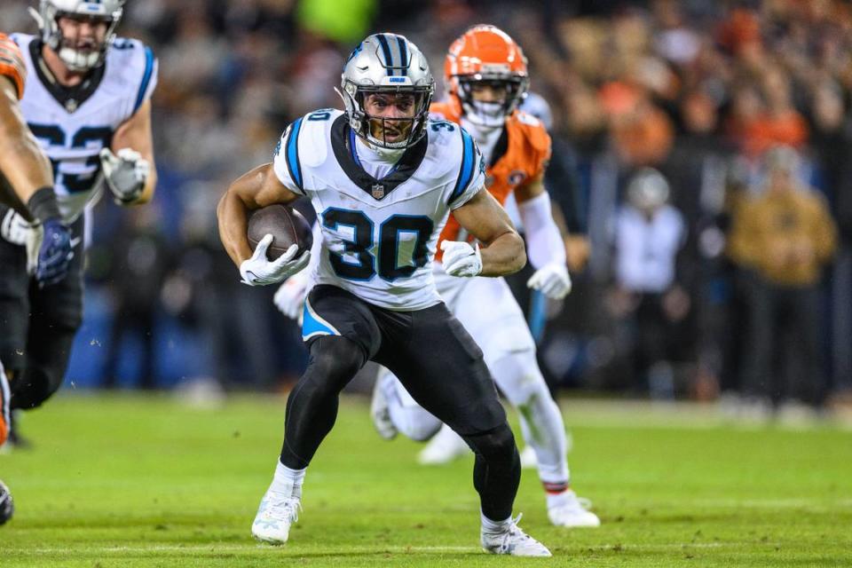 Carolina Panthers running back Chuba Hubbard (30) runs the ball against the Chicago Bears during the first quarter at Soldier Field.