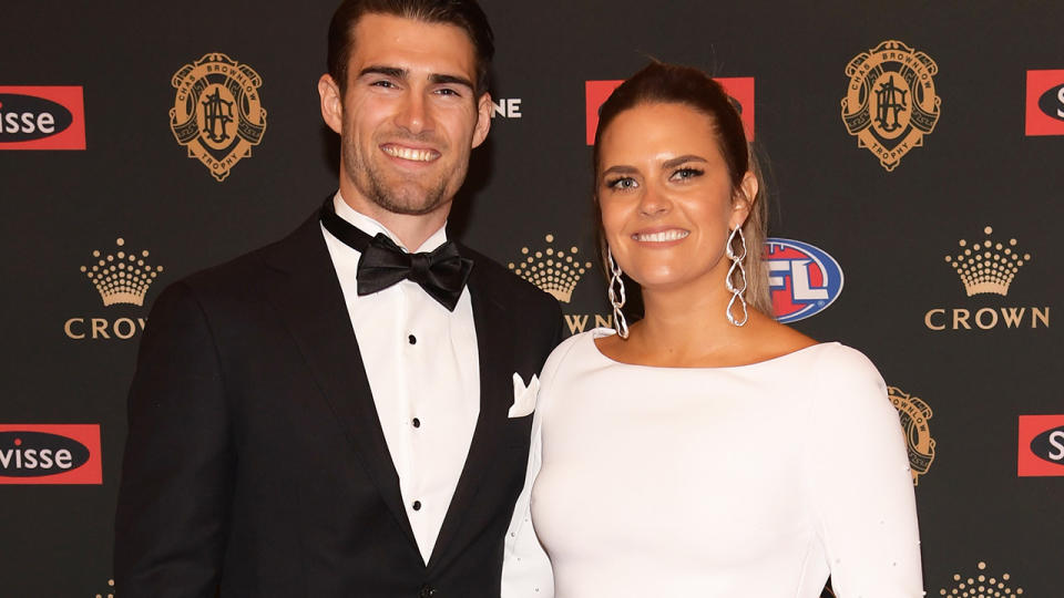 Easton and Tiffany Wood are pictured on the red carpet before the 2018 Brownlow Medal.