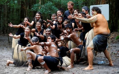 The Duke of Sussex poses for a photo with Butchulla People - Credit: Phil Noble /AP