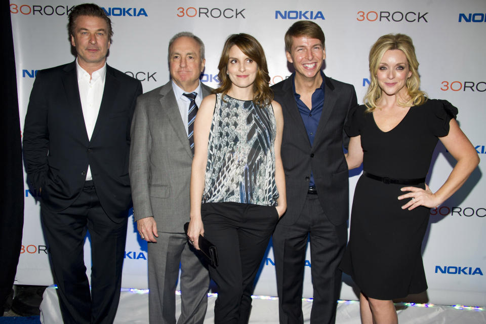 FILE - In this Dec. 20, 2012 file photo, Alec Baldwin, from left, Lorne Michaels, Tina Fey, Jack McBrayer and Jane Krakowski attend the "30 Rock" farewell wrap party in New York. At the request of co-creator Tina Fey, four episodes of the comedy “30 Rock” are being removed from circulation because they featured characters performing in blackface. The series aired on NBC from 2006 to 2013, but episodes are still being shown in television syndication and on streaming services including Hulu, Amazon Prime, iTunes and Peacock. (Photo by Charles Sykes/Invision/AP, File)