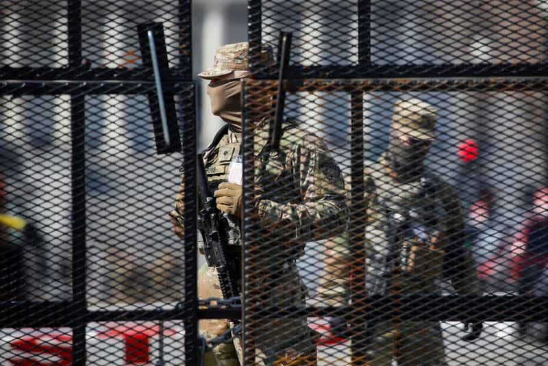 FILE PHOTO: National Guard soldiers stand guard near the U.S. Capitol in Washington