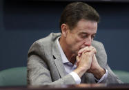 FILE - In this June 15, 2017, file photo, Louisville basketball coach Rick Pitino listens during an NCAA college basketball news conference in Louisville, Ky. Rick Pitino survived sex scandals and FBI investigations , won national championships , and when his coaching options seemingly dried up , he left for Greece. Somehow , the winding road of his career took him to Iona - and back in the NCAA Tournament. The last stop - he swears it’s true - of his career. (Alton Strupp/The Courier-Journal via AP, File)