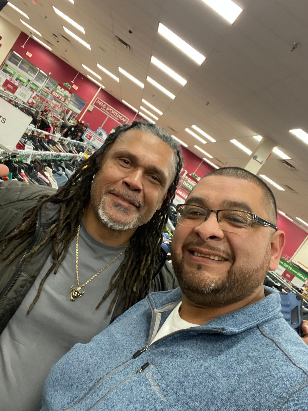 Ruben Gaona, right, poses with a client from "My Way Out," a program with a high success rate in helping people make the transition from prison back to their lives.