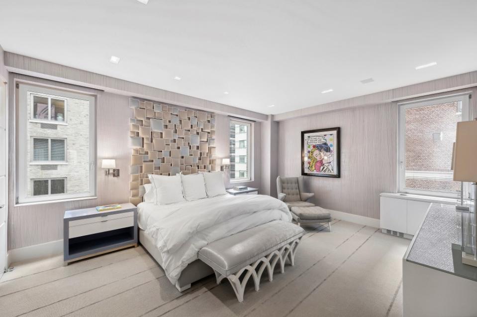 The main bedroom looks out on NYC’s bustling Upper East Side. Richard Caplan