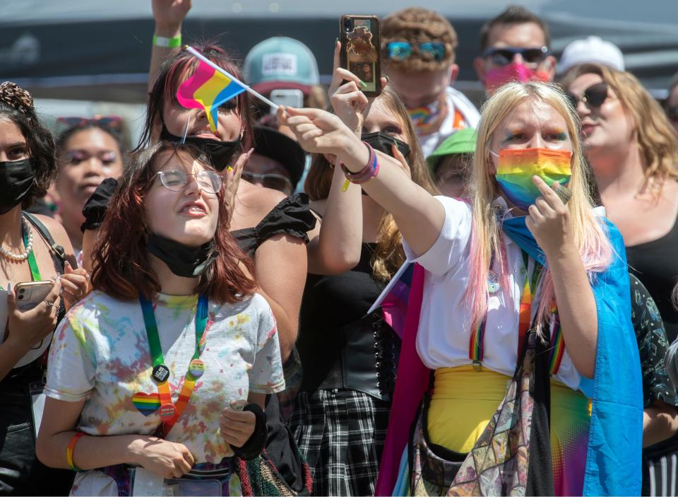 Mady Seibel, left, and Elizabeth Buckmann enjoy the drag show at the Lodi Pride festival hosted by the nonprofit A New Lodi at High Water Brewing in Lodi. The festival included a drag hour, live entertainment, and even an activity corner with coloring and games for children. Hundreds of people attended the first ever event in Lodi. 