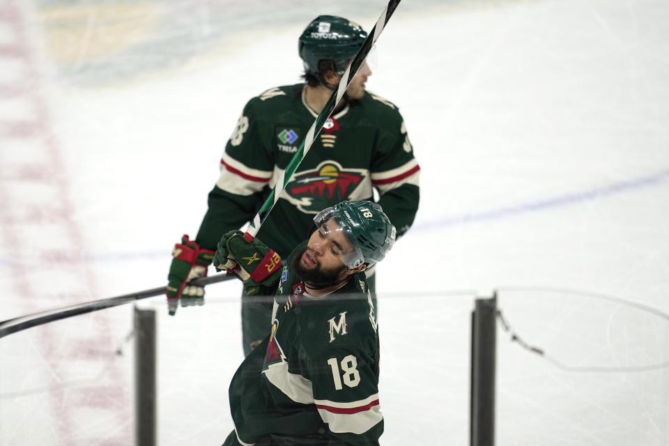 Minnesota Wild left wing Jordan Greenway (18) reacts after a missed shot-attempt during the third period of an NHL hockey game against the Dallas Stars, Thursday, Dec. 29, 2022, in St. Paul, Minn. (AP Photo/Abbie Parr)