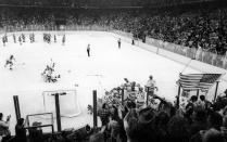 In this Feb. 22, 1980, photo, the United States Olympic hockey team celebrated its upset victory over the Soviet Union, the four-time defending Olympic champions, during the medal-round of the Winter Olympics in Lake Placid, N.Y. Tourism is a $1.2 billion industry in the Lake Placid region, much of it still fueled by the memory of the U.S. hockey team beating the Soviet Union as the “Miracle on Ice" highlight of the 1980 Olympic Games. (Tom Sweeney/Star Tribune via AP)