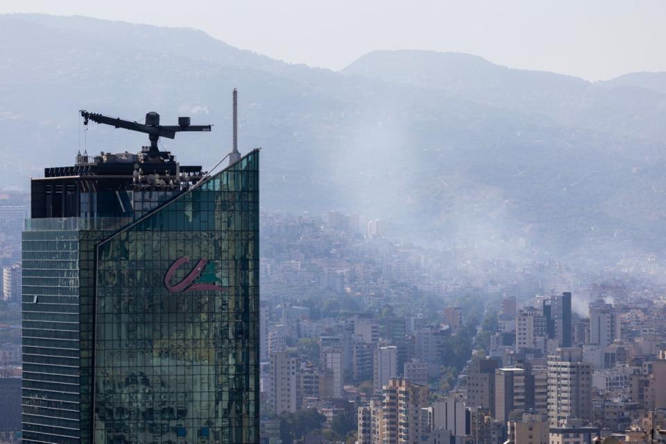 Smoke rises from Israeli airstrike locations on Sunday in Beirut’s southern suburbs (Getty)