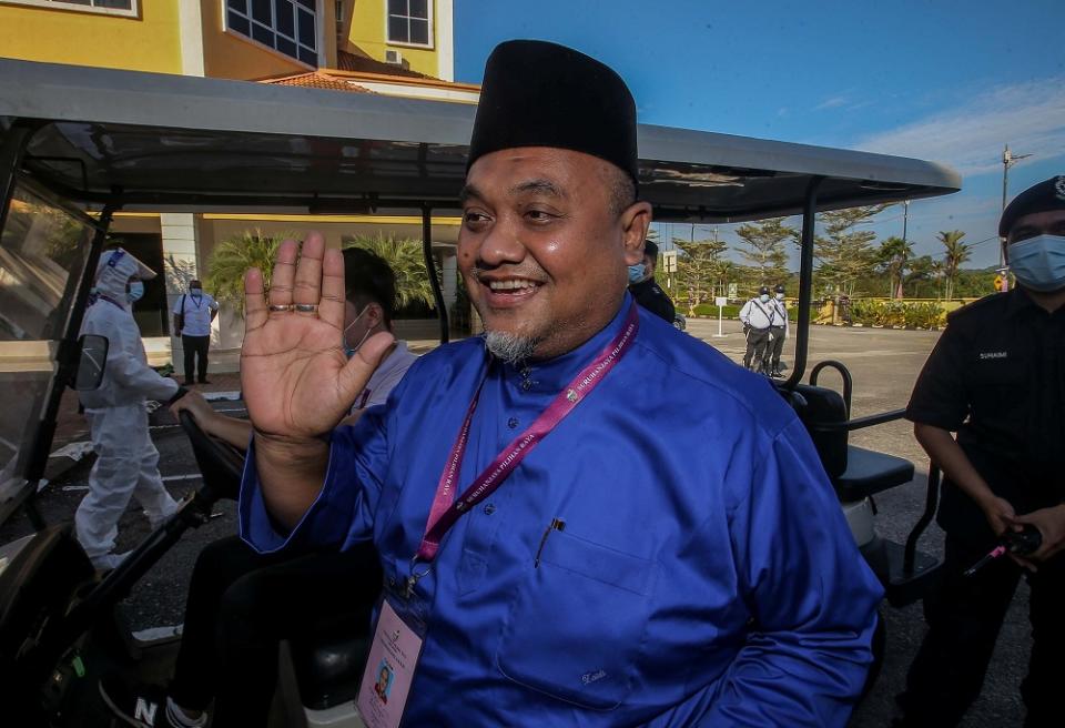 Barisan Nasional candidate Mohd Zaidi Aziz arrives at the nomination centre in Tanjung Malim August 15, 2020.