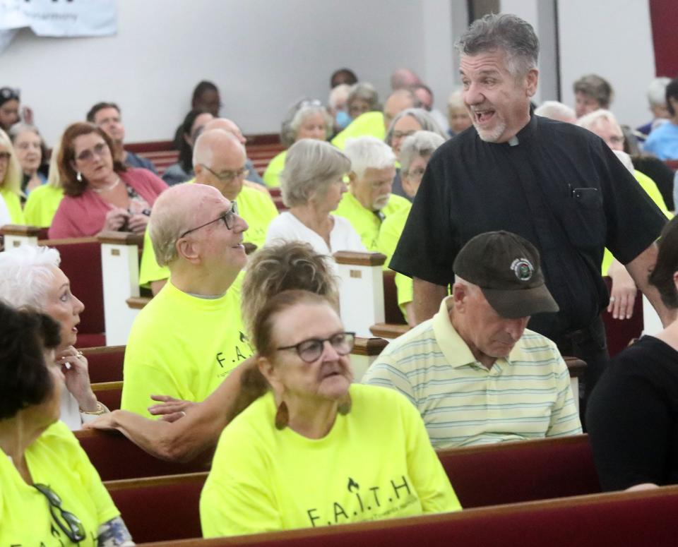 The Rev. Phil Egitto, pastor of Our Lady of Lourdes Catholic Church in Daytona Beach, has been a strong and active backer of the FAITH group's initiatives for years. Egitto is pictured at a FAITH assembly in October.