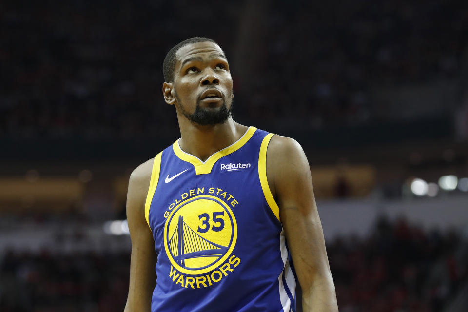 HOUSTON, TX - MAY 04:  Kevin Durant #35 of the Golden State Warriors looks toward the scoreboard in the second quarter during Game Three of the Second Round of the 2019 NBA Western Conference Playoffs against the Houston Rockets at Toyota Center on May 4, 2019 in Houston, Texas.  NOTE TO USER: User expressly acknowledges and agrees that, by downloading and or using this photograph, User is consenting to the terms and conditions of the Getty Images License Agreement.  (Photo by Tim Warner/Getty Images)