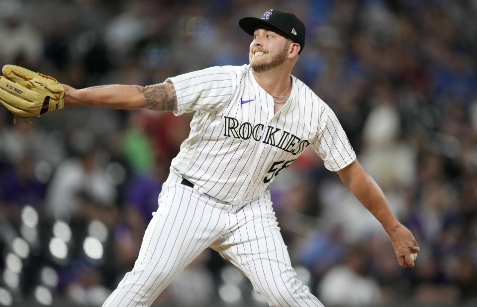 Colorado Rockies relief pitcher Lucas Gilbreath works against the Kansas City Royals during the ninth inning of a baseball game Saturday, May 14, 2022, in Denver. (AP Photo/David Zalubowski)