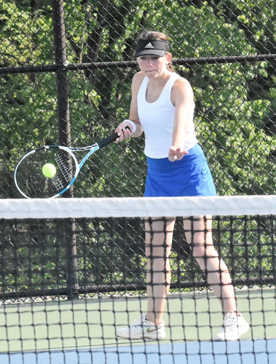 Grace Coryea, part of the Patriots' number one doubles team, returns the ball. Coryea and her partner, Bre Davis won both their sectional semifinal and final matches and advance to the individual final this week.