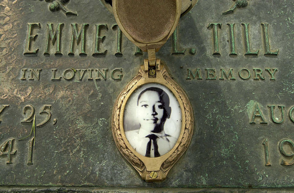 FILE - This May 4, 2005, file photo shows Emmett Till's photo on his grave marker in Alsip, Ill. Sixty-five years after 14-year-old Emmett Till was lynched in Mississippi, Congress is set to approve legislation designating lynching as a hate crime under federal law. The bill, named after Till, is intended to send a powerful message to confront violent racism and hatred that continues decades after the black teenager was murdered for allegedly whistling at a white woman. (Robert A. Davis/Chicago Sun-Times via AP, File)