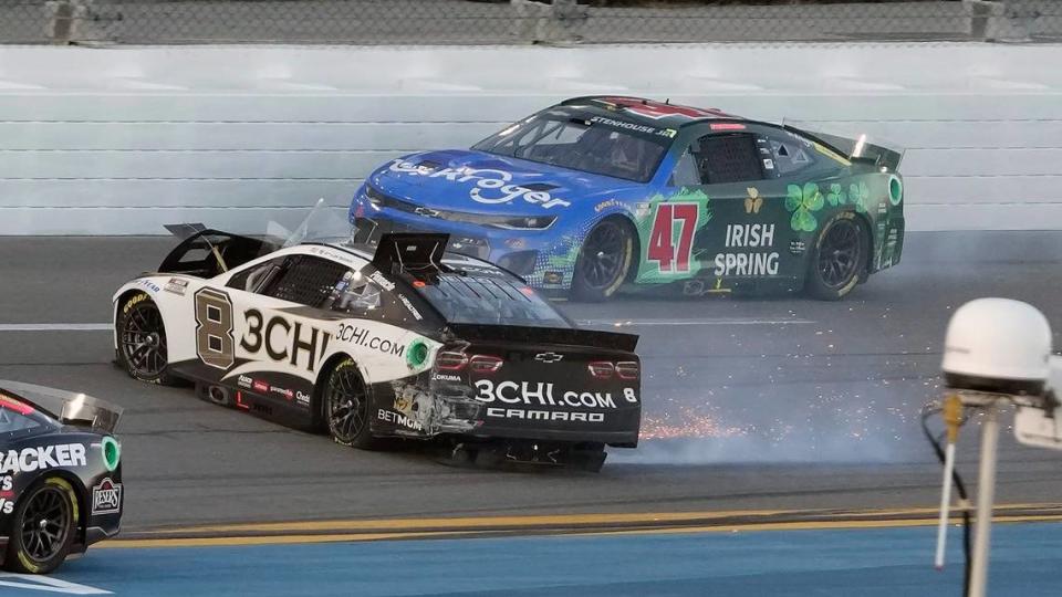 Tyler Reddick (8) slides by Ricky Stenhouse Jr. (47) after crashing during the NASCAR Daytona 500 auto race Sunday, Feb. 20, 2022, at Daytona International Speedway in Daytona Beach, Fla. (AP Photo/Chris O’Meara)