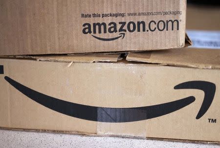 Two freshly delivered Amazon boxes are seen on a counter in Golden, Colorado August 27, 2014. REUTERS/Rick Wilking
