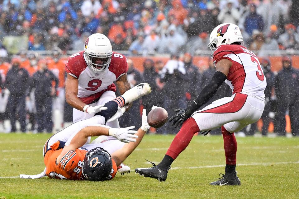 Dec 5, 2021; Chicago, Illinois, USA; Arizona Cardinals safety Budda Baker (3) intercepts the football in the first half against Chicago Bears tight end Cole Kmet (85) at Soldier Field. Mandatory Credit: Quinn Harris-USA TODAY Sports