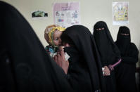 <p>Mothers and children crowd into a center for treating malnutrition at the main hospital in the town of al-Khoukha, Yemen, in this Feb. 12, 2018 photo. They left empty-handed: The center has virtually run out of supplies, even as doctors estimate 40 percent of the children in the town suffer from malnutrition. Shifting front lines in the war have cut off aid routes and fighting has driven thousands of people to take refuge in the town. (Photo: Nariman El-Mofty/AP) </p>