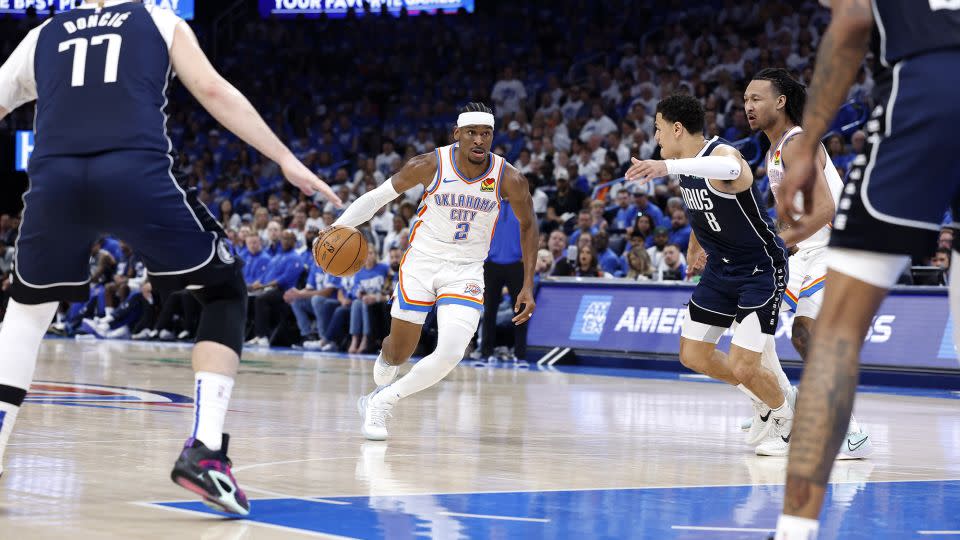 Gilgeous-Alexander dribbles during the game. - Alonzo Adams/USA TODAY Sports/Reuters