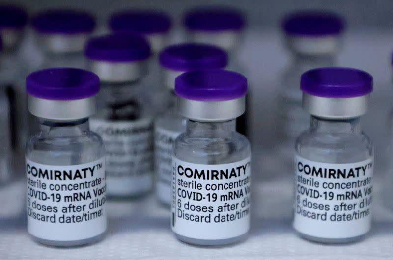 FILE PHOTO: Injections with doses of the Pfizer-BioNTech Comirnaty coronavirus disease (COVID-19) vaccine are pictured in Berlin