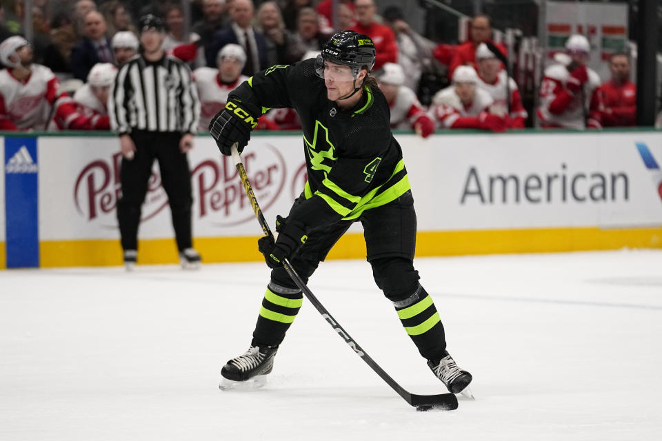 Dallas Stars defenseman Miro Heiskanen takes a shot, and scores in the first period of an NHL hockey game against the Detroit Red Wings in Dallas, Monday, Dec. 11, 2023. (AP Photo/Tony Gutierrez)
