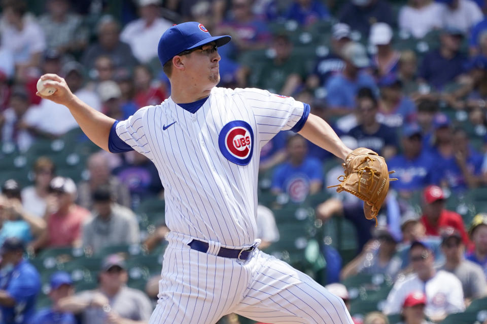 Chicago Cubs starting pitcher Alec Mills delivers during the first inning of a baseball game against the Cincinnati Reds Thursday, July 29, 2021, in Chicago. (AP Photo/Charles Rex Arbogast)