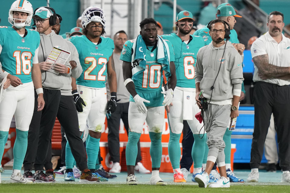 Miami Dolphins head coach Mike McDaniel looks up from the sidelines during the first half of an NFL football game against the Tennessee Titans, Monday, Dec. 11, 2023, in Miami. (AP Photo/Lynne Sladky)