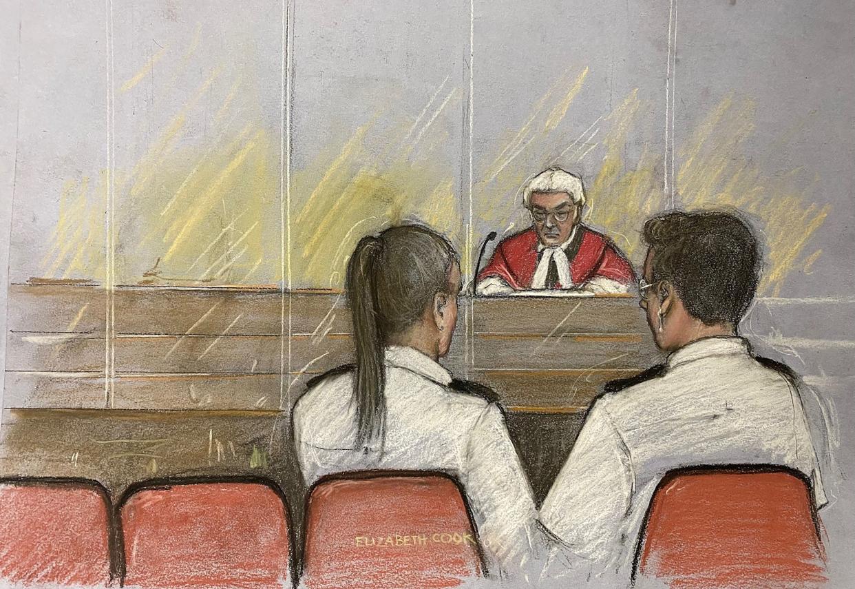 A court artist drawing by Elizabeth Cook showed Judge Mr Justice Goss addressing the dock containing two dock offices beside empty seats during the sentencing (Elizabeth Cook/PA Wire)